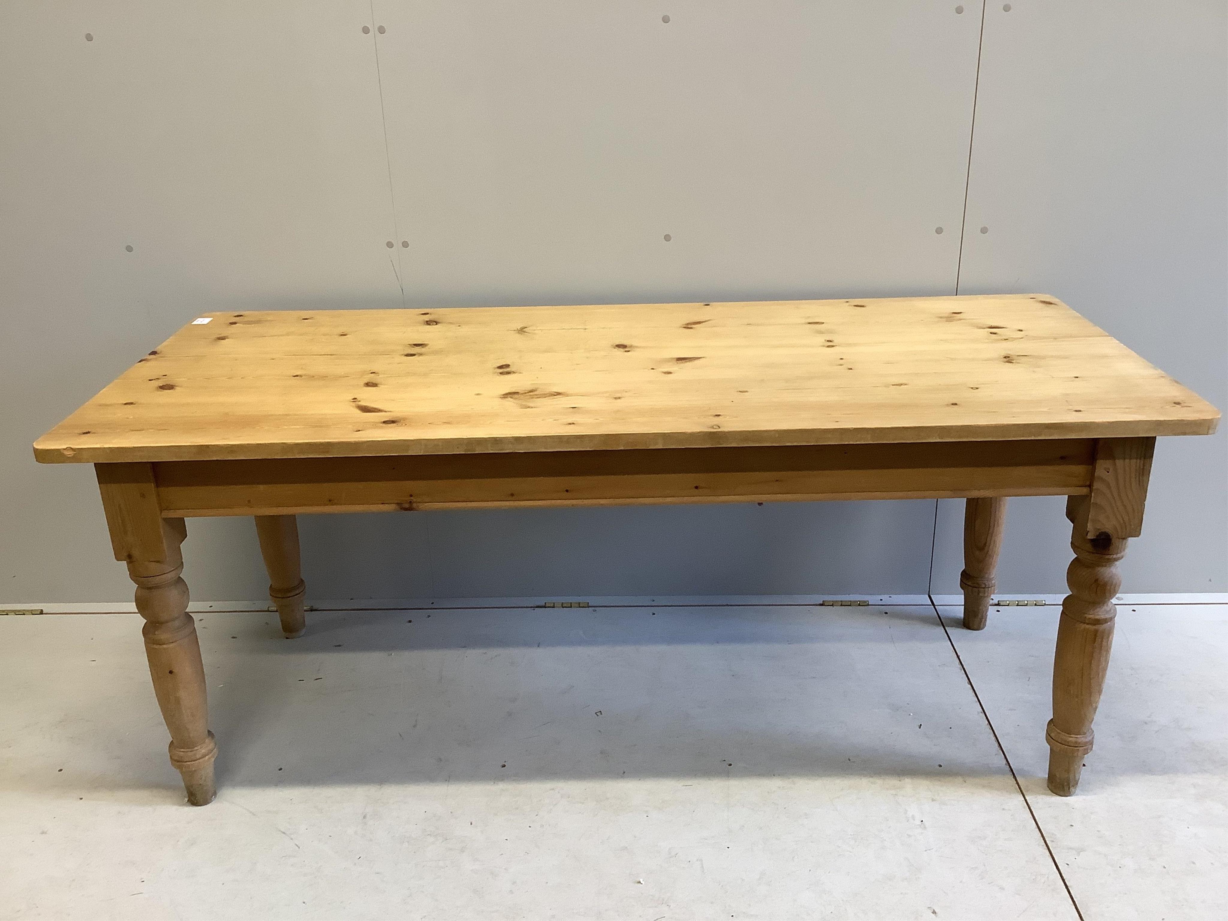 A Victorian style rectangular pine kitchen table, width 183cm, depth 76cm, height 76cm. Condition - fair to good